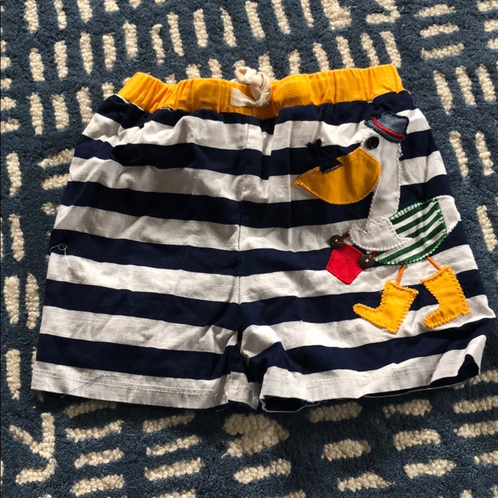Mud Pie baby swim trunks